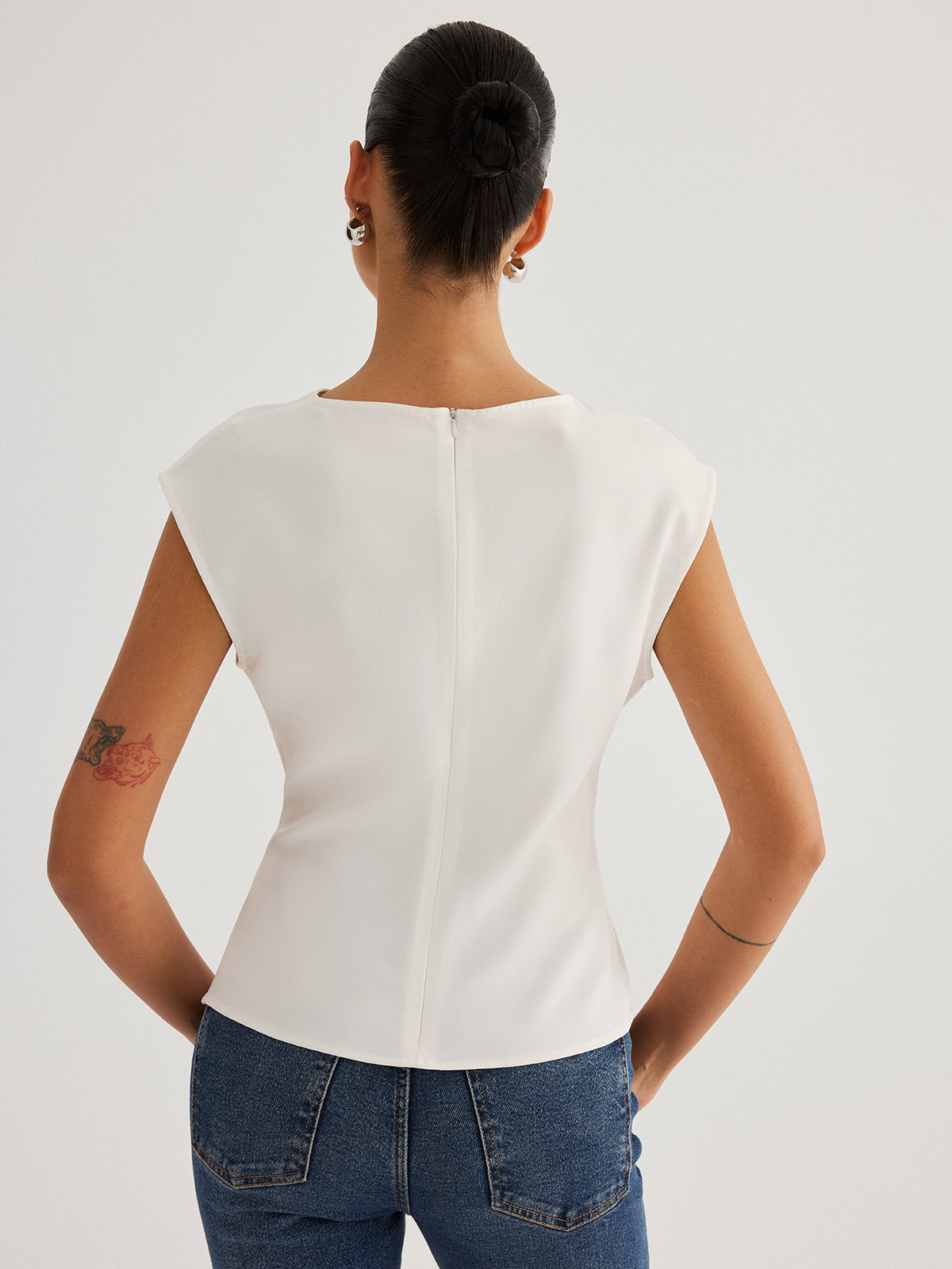 Sleeveless Twisted Waist Blouse